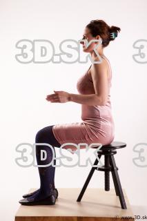 Sitting reference of whole body pink dress purple tights black…
